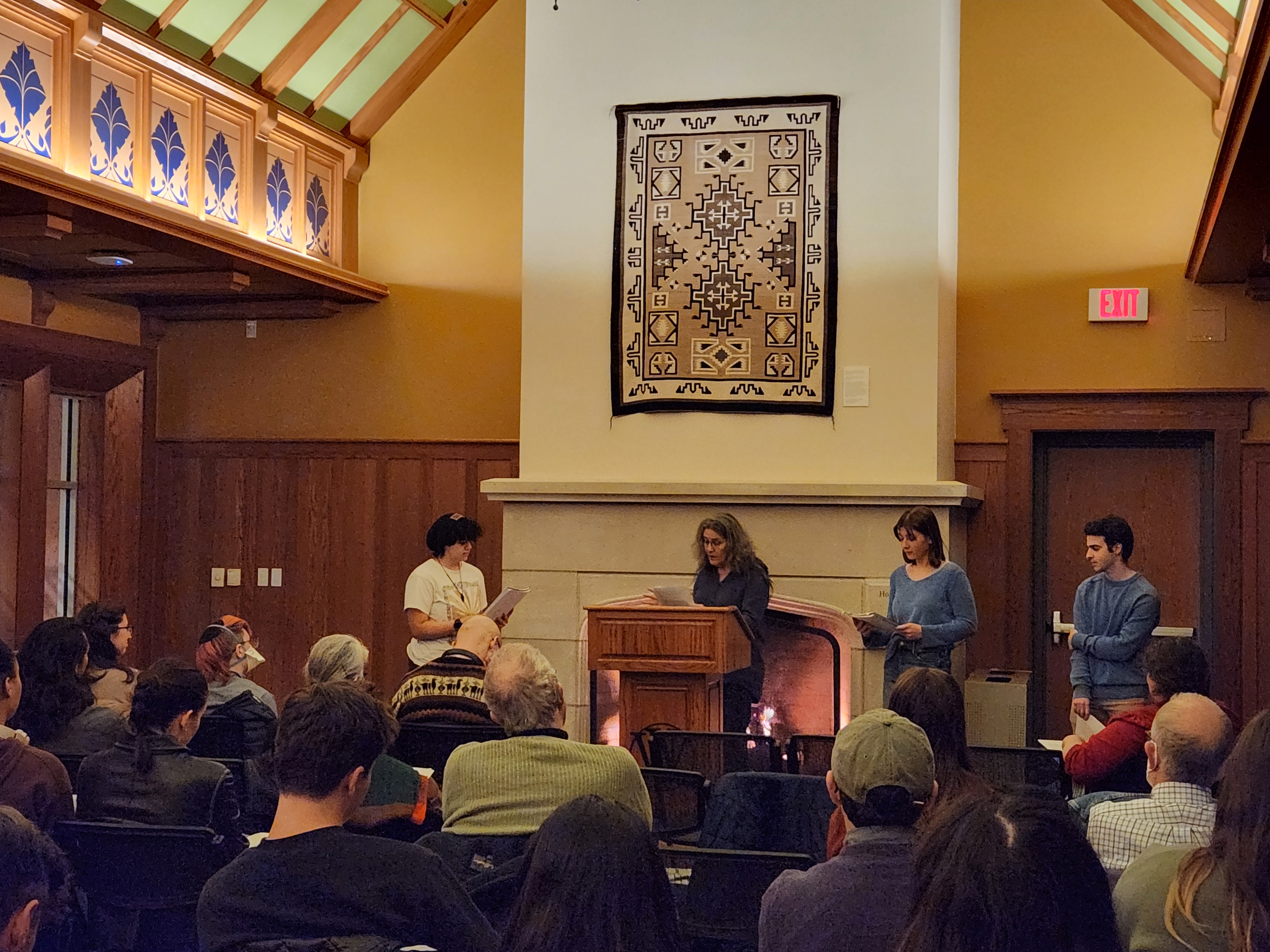 Diane and three students read from her translation in front of an audience in the Goldberg Lounge