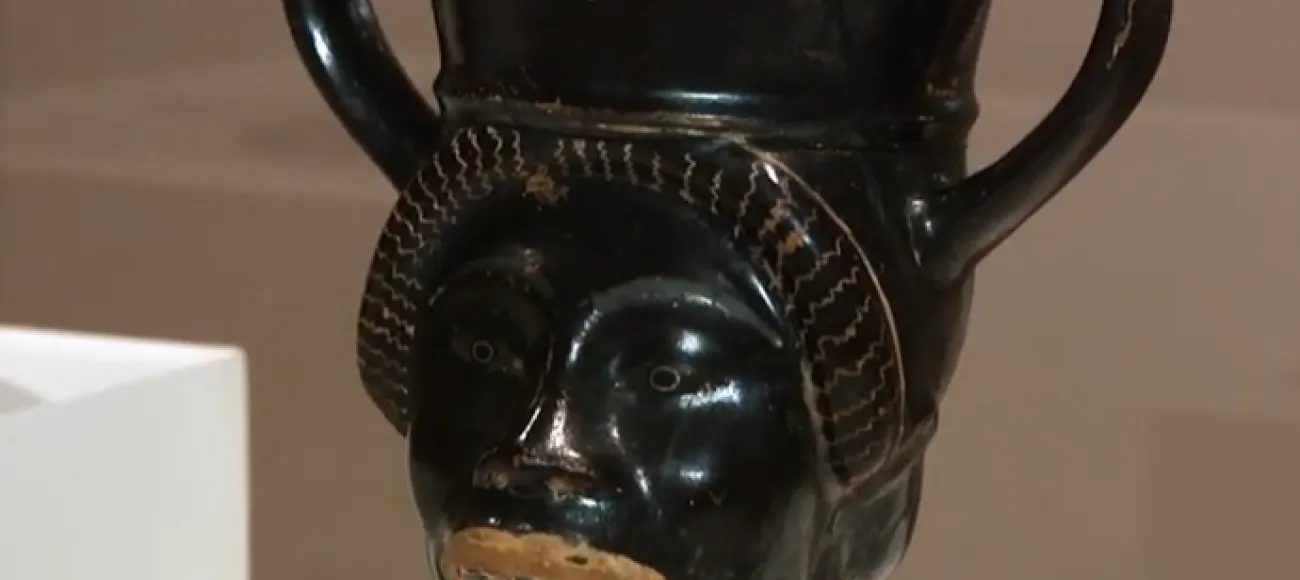 vase with image of face