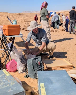 Student working at an excavation