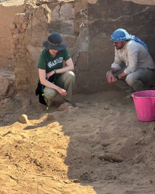 Discussing mud bricks in Room 9 of House B10 with archaeologist Cesare Iezzi (Università del Salento). 