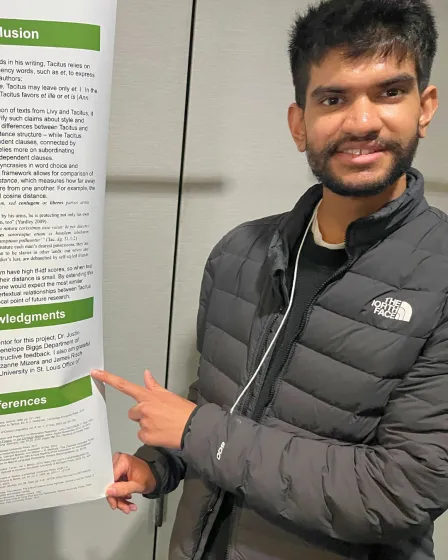 Palavajjhala presenting his data on a poster