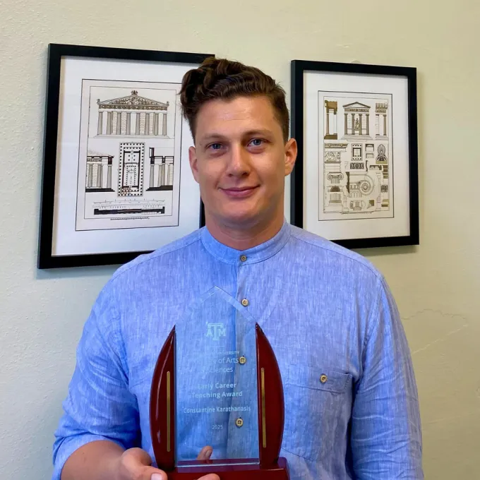 Karathanasis holding award