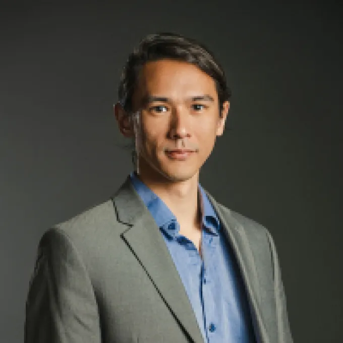 Chris Erdman in a gray suit