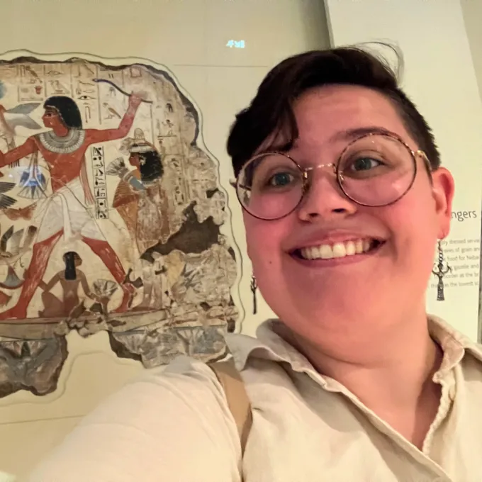 Stein next to an Egyptian painting