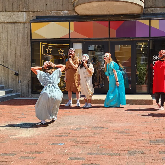 high school students dressed in costume and masks