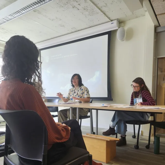 Wang presenting at conference